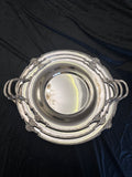 Rounded serving trays with hands