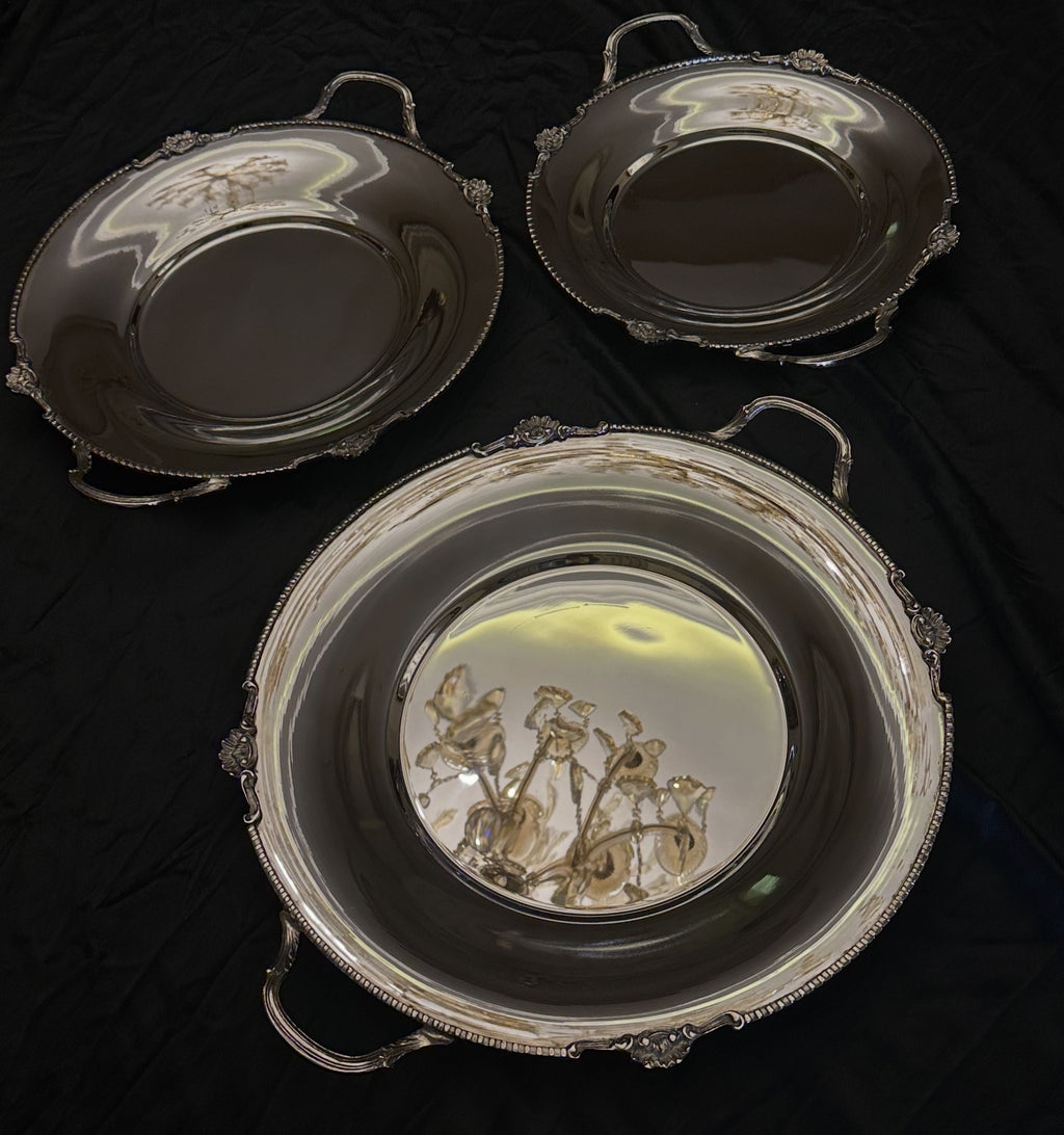 Rounded serving trays with hands